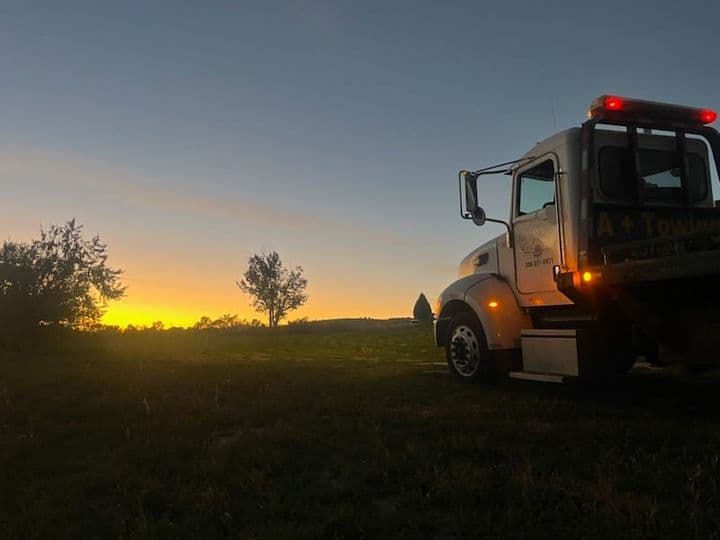 A-Plus tow truck at sunset